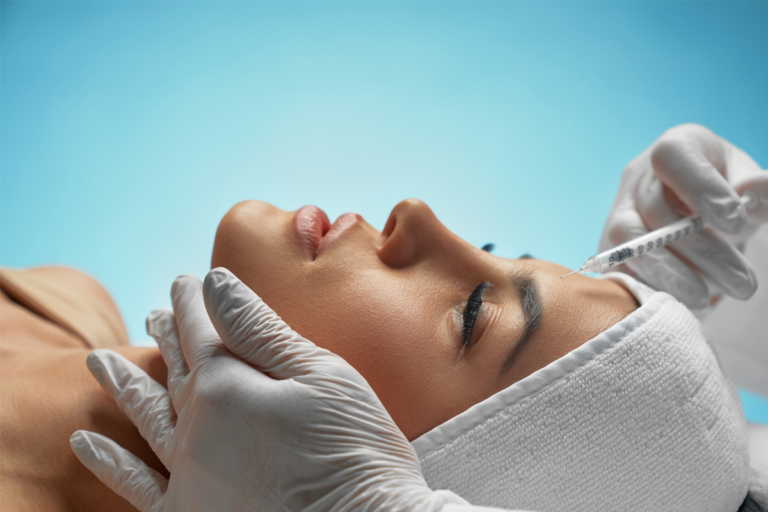 Woman relaxing during an aesthetic skin treatment